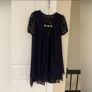 Brand new purple one piece short sleeve dress